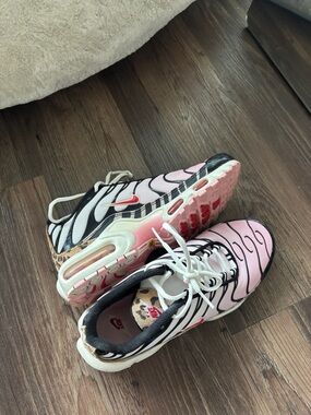 Nike Women’s Pink, Black and Leopard Air Max Plus Sneakers